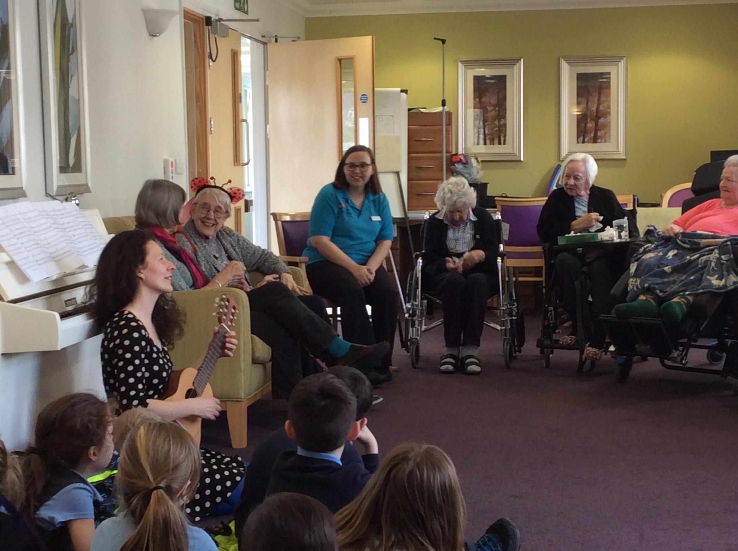 Cheltenham Scouts and Windsor Street Care Centre residents sing